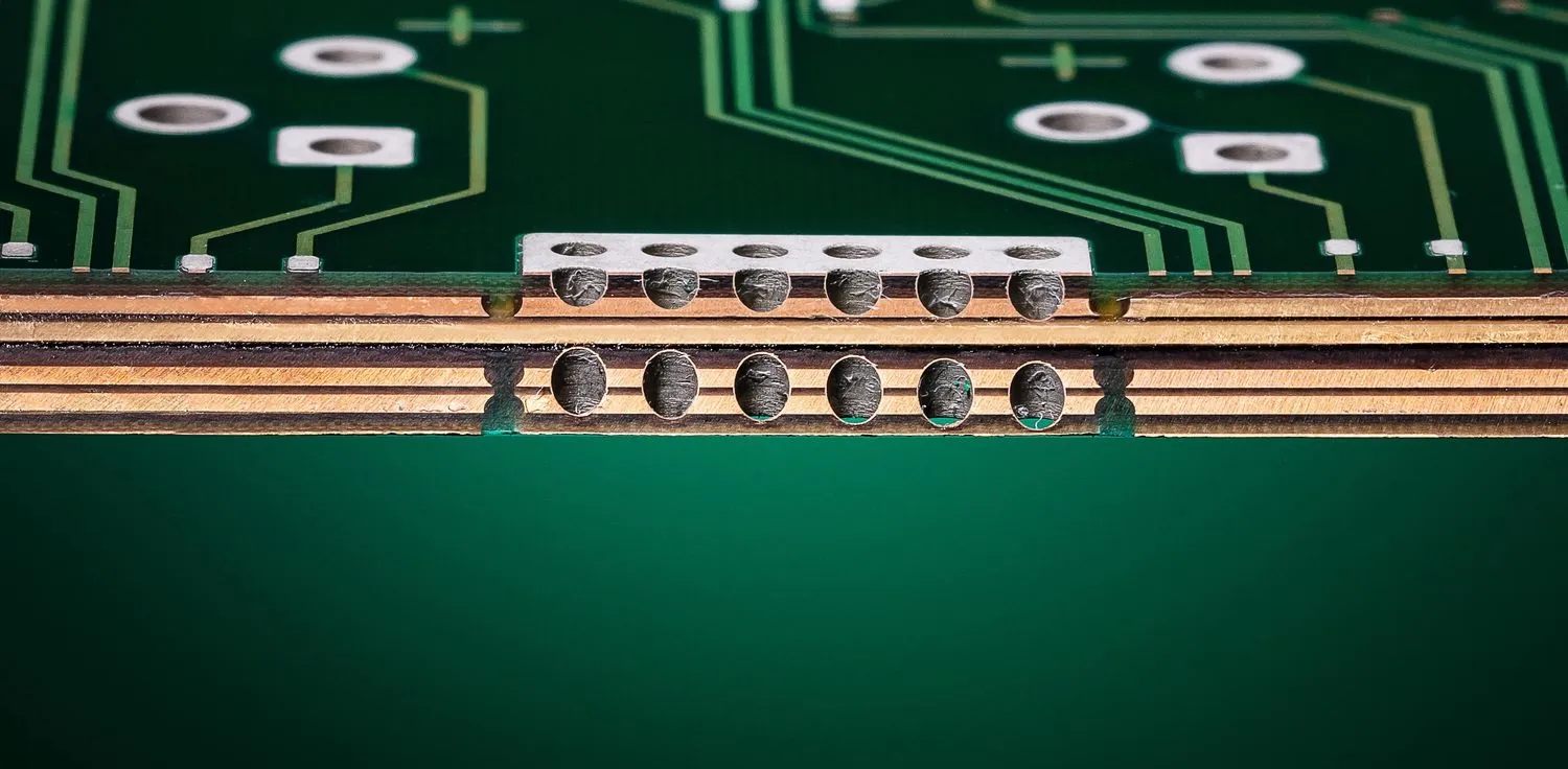 Cross-section of heavy copper PCB for avionics showing thick copper layers