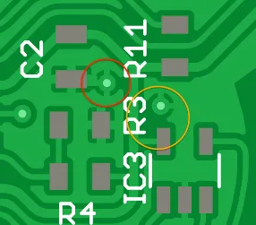 Thermal relief pattern on PCB pad for soldering ease.