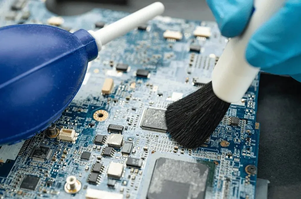 Cleaning PCB corrosion using a brush and isopropyl alcohol