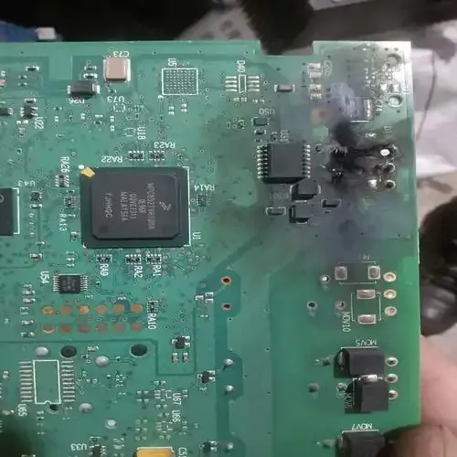 Damaged capacitor on a network switch PCB causing power distribution problems