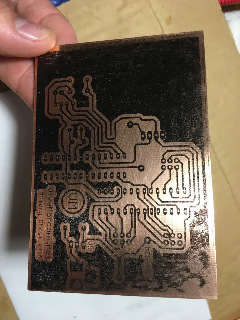 PCB design transferred to copper board using toner method