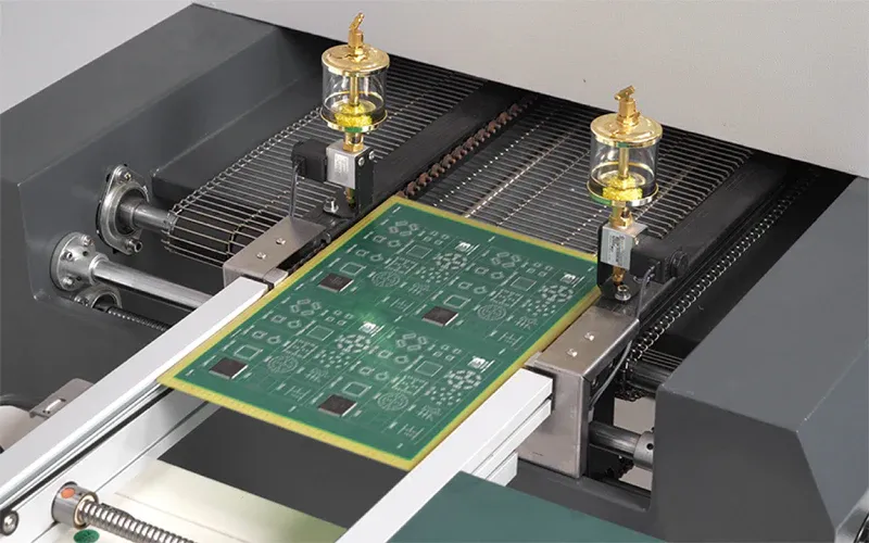 Reflow oven heating PCB assembly for soldering