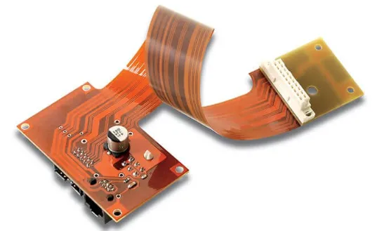 Rigid-flex PCB assembly with components and stiffeners.