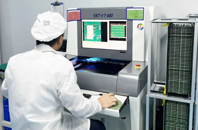 AOI machine scanning PCB for defects during mass production.