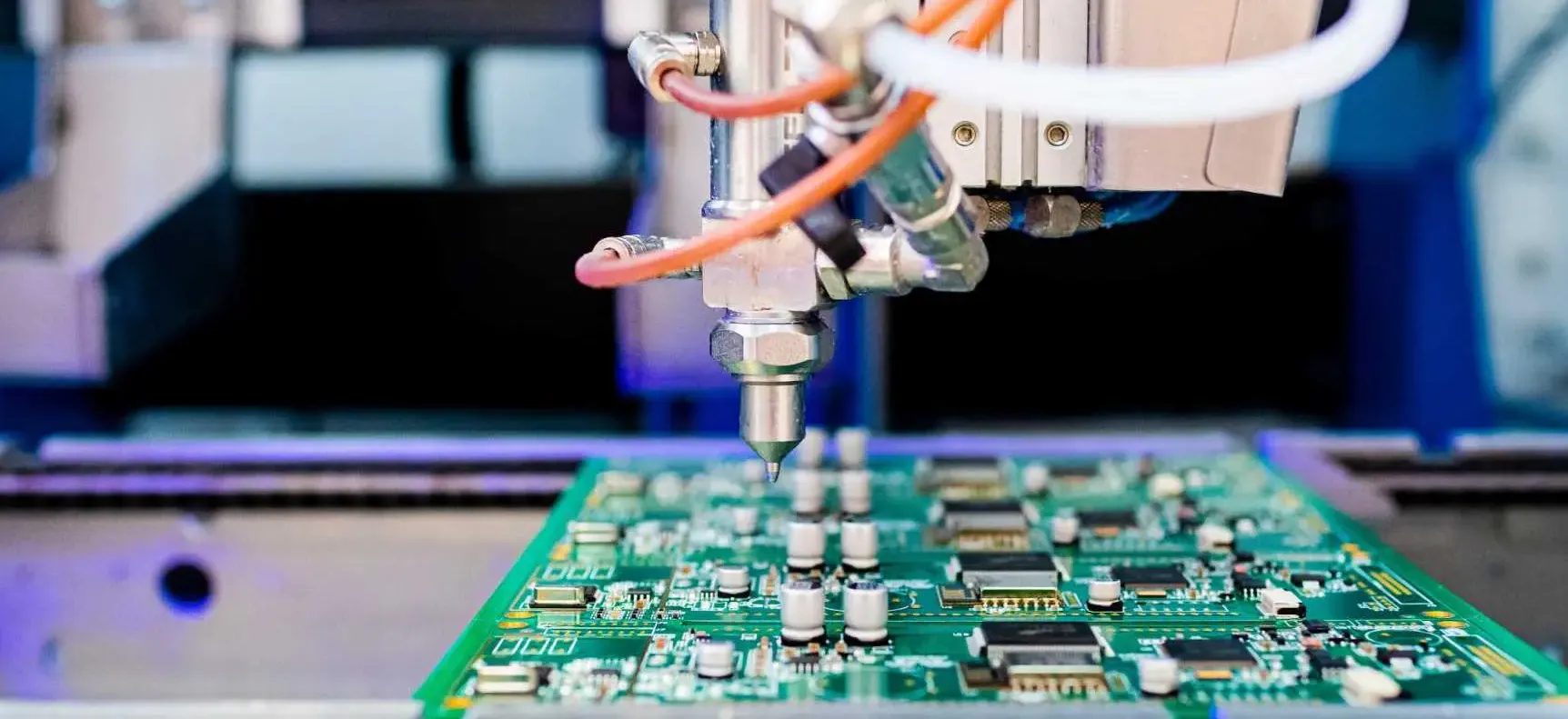 PCB drying in an oven for surface preparation before conformal coating.