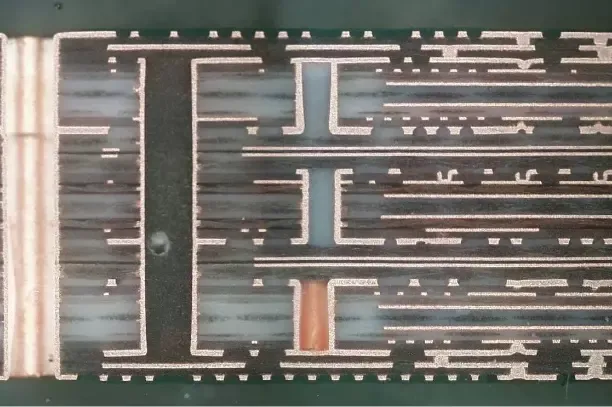Cross-section of a multilayer PCB showing internal traces and vias