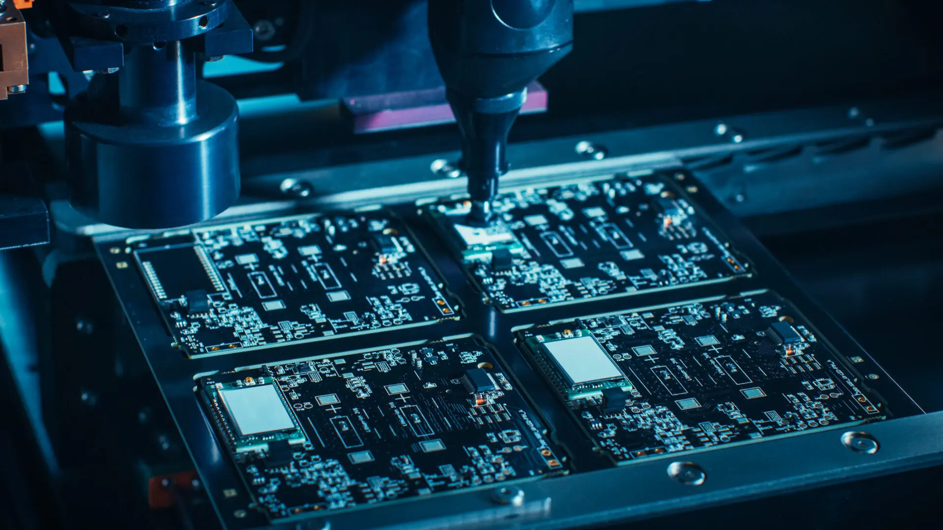Automated pick-and-place machine aligning components on PCB for reflow soldering.