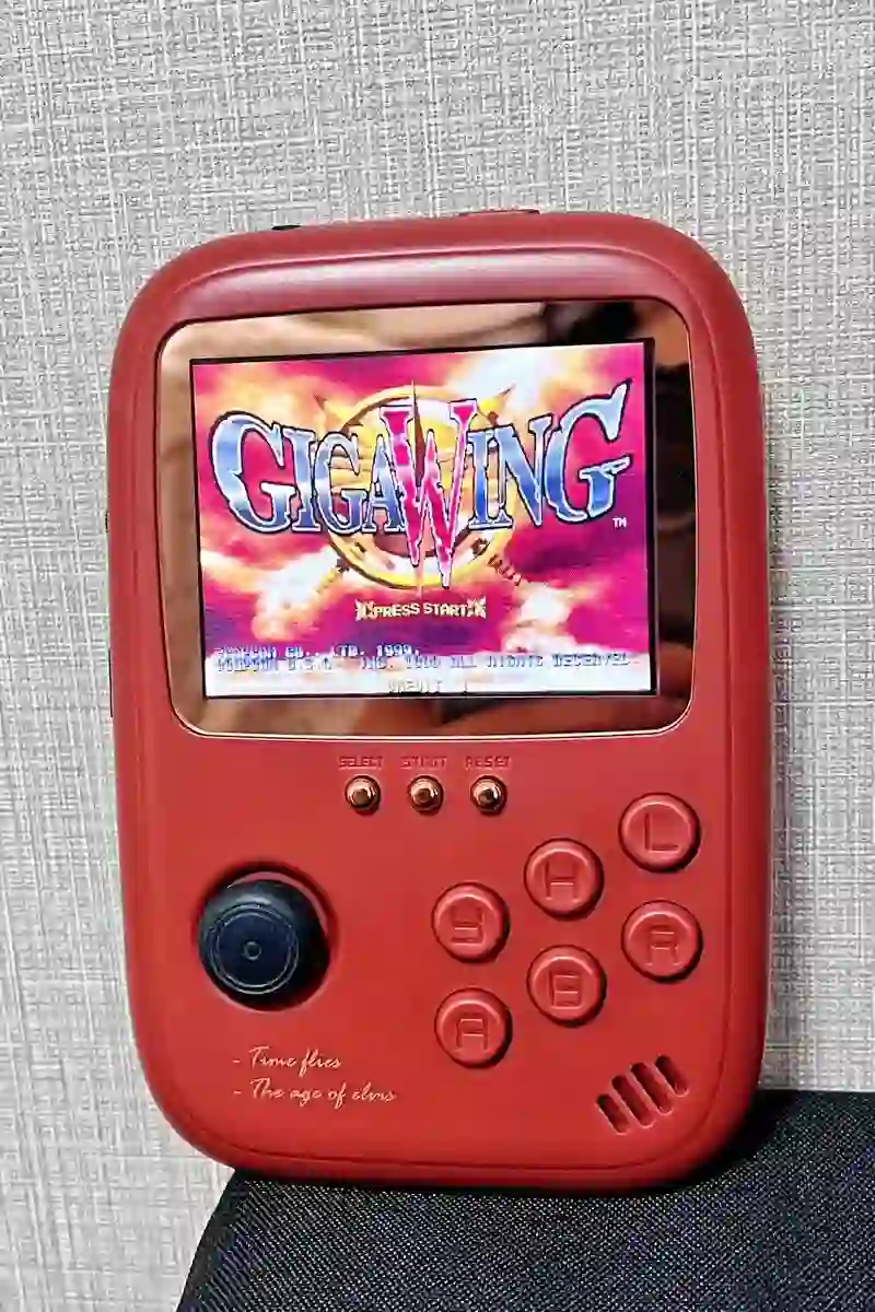 Repaired gaming console powered on and running a game.