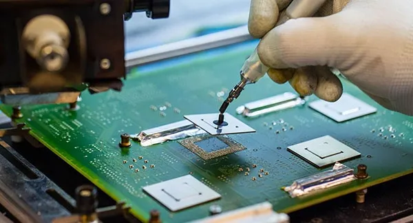 Small component soldering for wearable electronics prototyping.