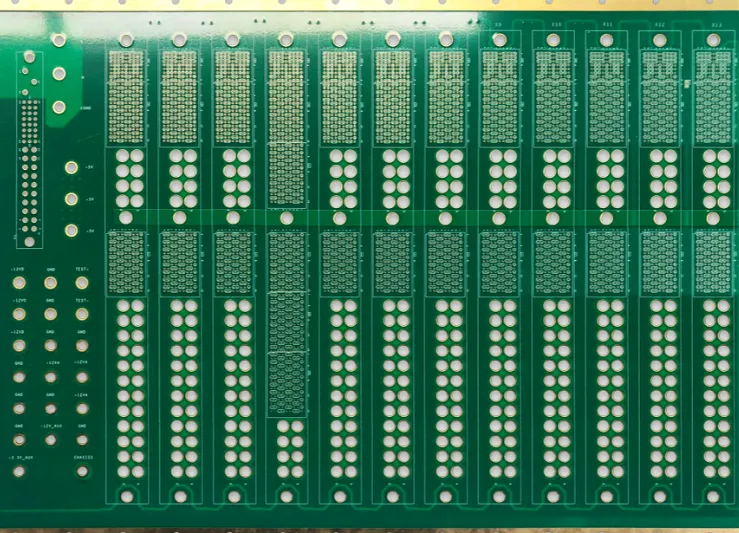 Cleaned PCB inspected under magnification after rework