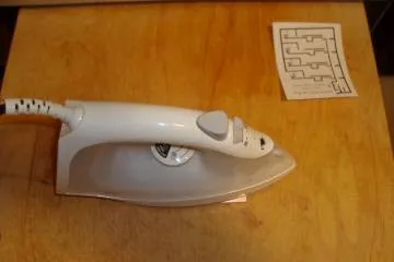 Toner transfer method for DIY PCB using an iron.
