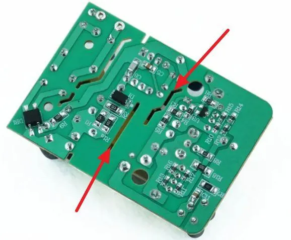 PCB design with slots for increased creepage distance in high-voltage applications.