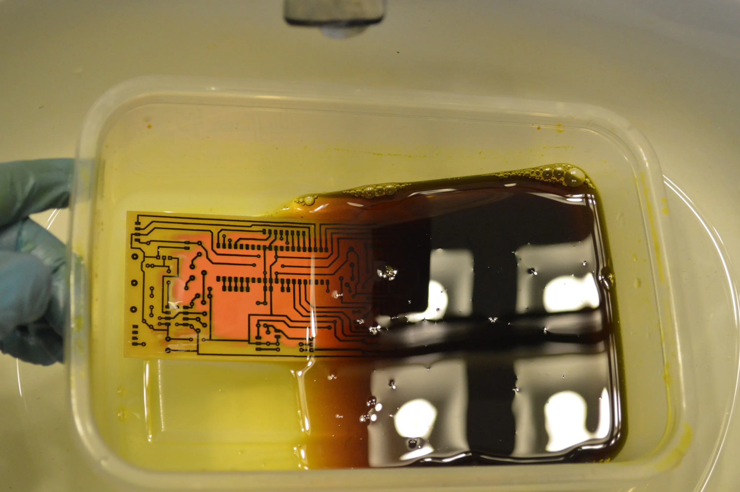 ferric chloride solution in a container