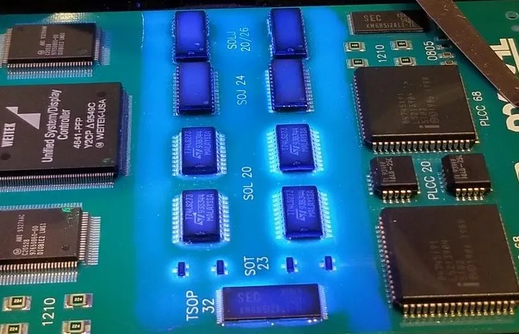 UV light inspection of conformal coating on SMT PCB