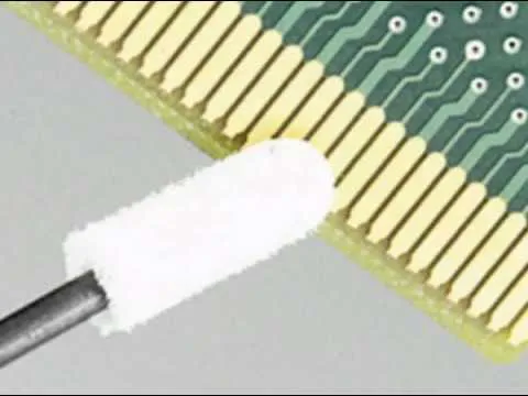 Applying gold plating solution to PCB gold fingers with a repair kit.
