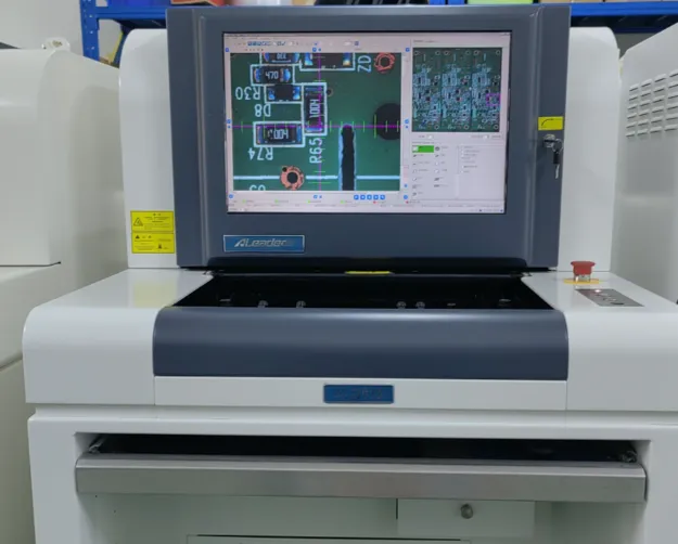 Automated Optical Inspection machine checking a PCBA for defects