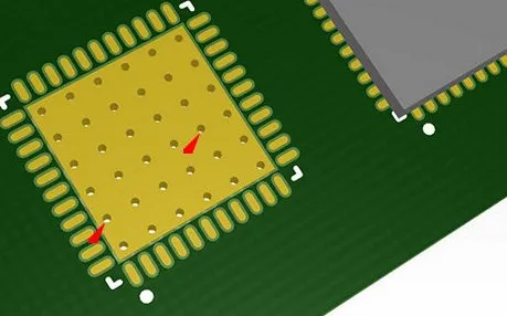 Close-up of thermal vias on a PCB for heat dissipation in hobbyist projects