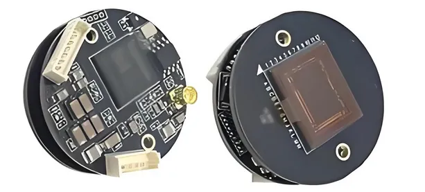 Fully assembled security camera with PCB mounted in housing.
