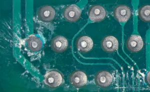 Close-up of PCB with no-clean flux residue after soldering