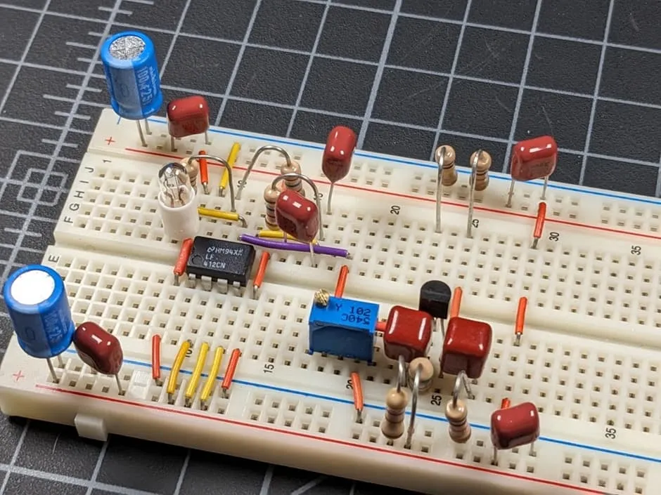 DIY electronics components list on a breadboard setup