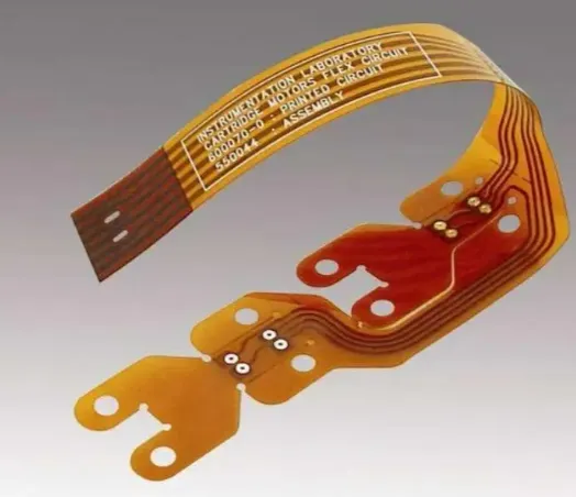Flexible PCB with laser-drilled vias in a wearable device