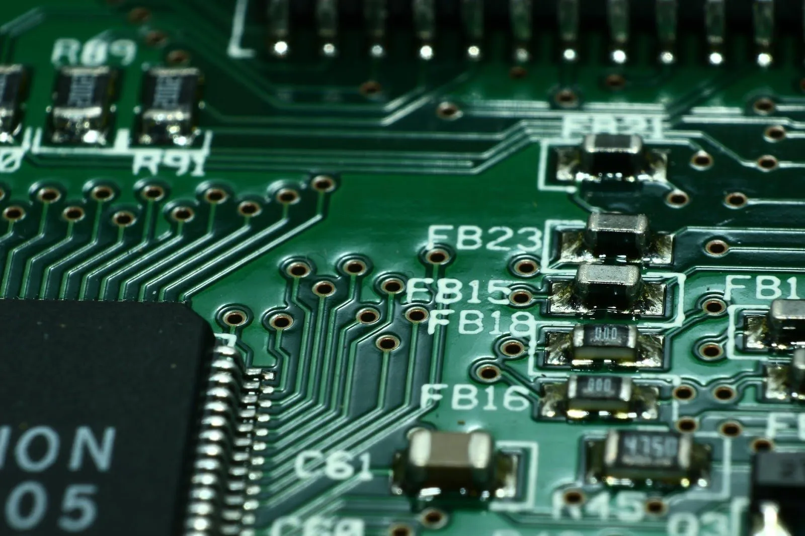 Close-up of PCB silk screen layer with component labels.