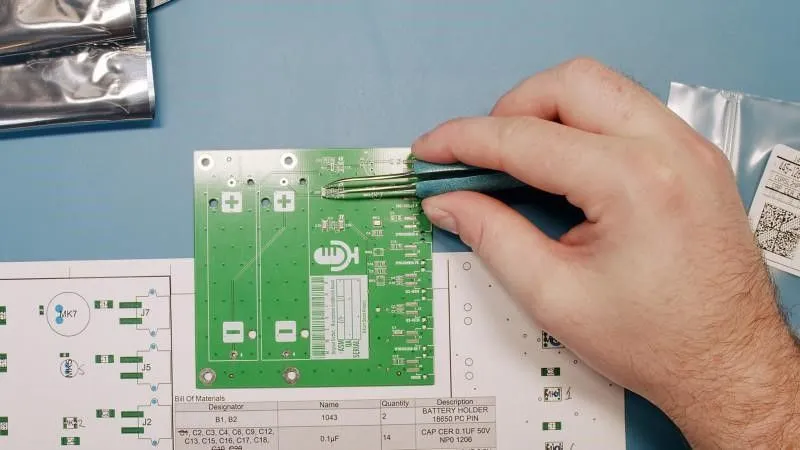 Hand soldering SMT components on PCB for beginners.