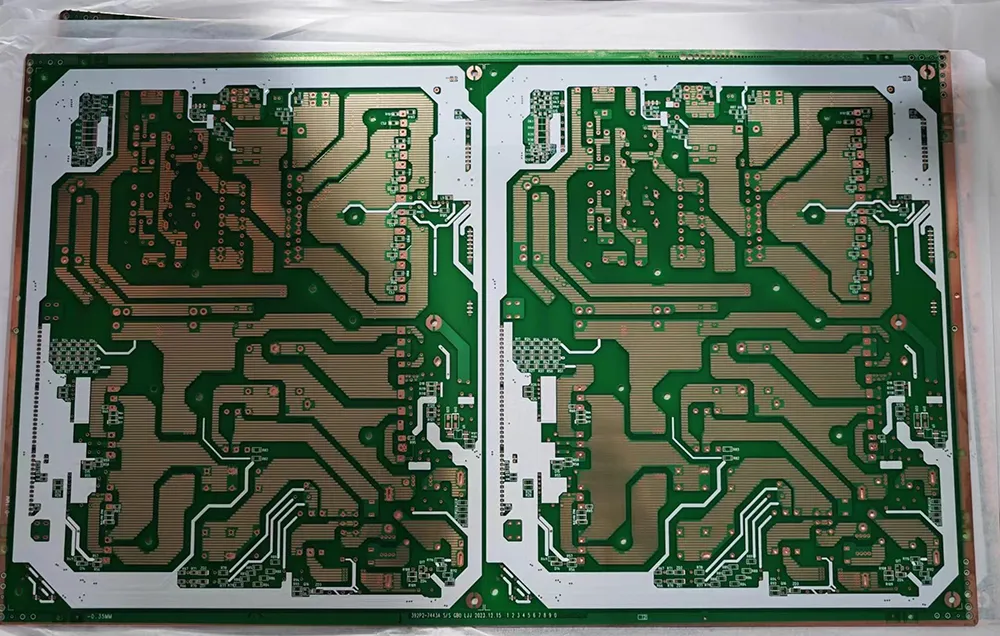 Close-up of PCB with solder mask removed exposing copper traces.