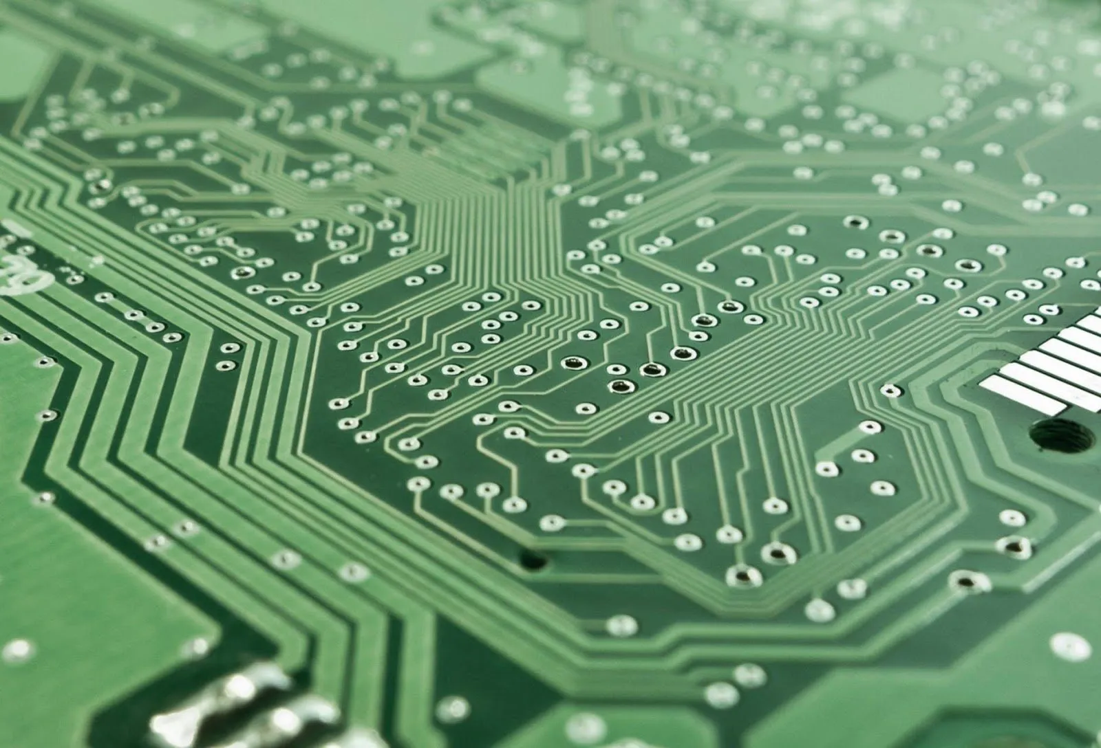 Close-up of a PCB with HASL surface finish showcasing solder coating.