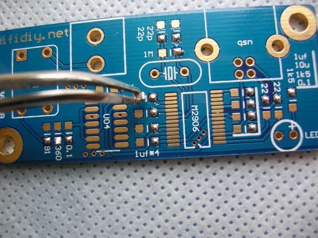 Soldering fine-pitch components on an ENIG finish PCB for precision.