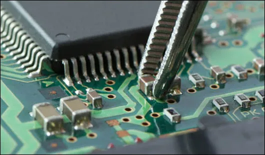 SMT assembly process with pick-and-place machine for SMD LEDs.
