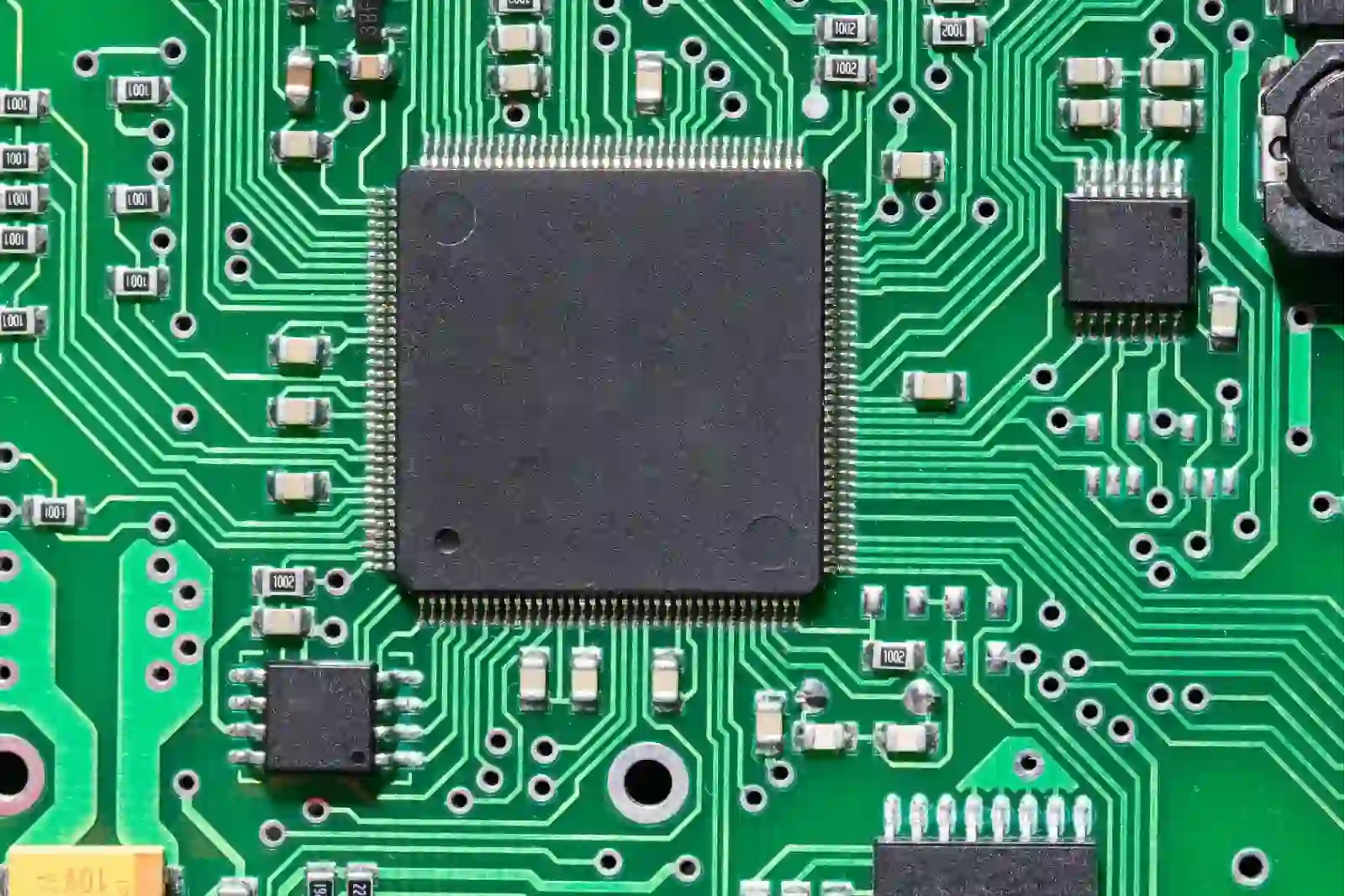 Cost vs. performance analysis for choosing a microprocessor for PCB.