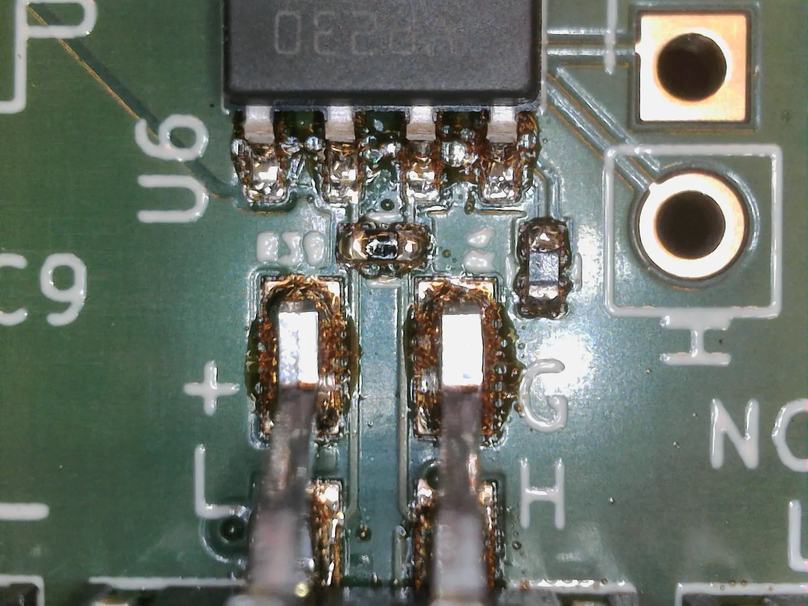 PCB with flux residue before rinsing.
