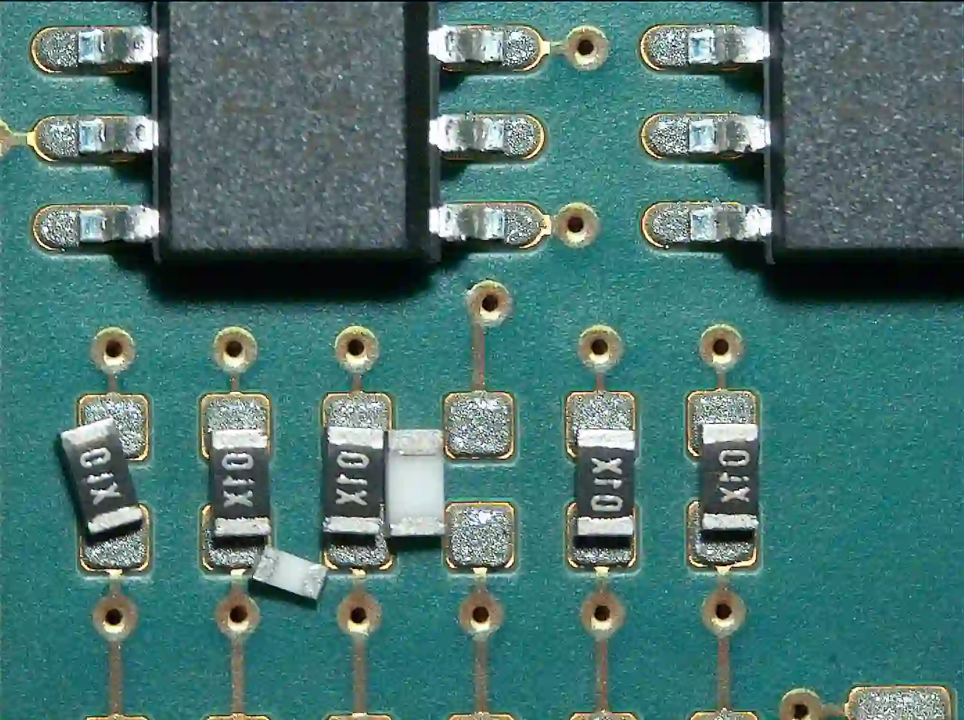 Scrapped PCBs due to component misplacement and rework damage