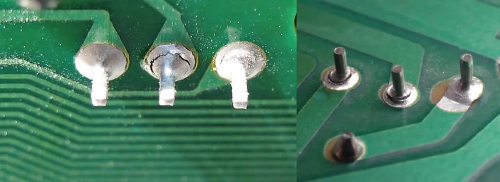 Close-up of PCB solder joint issues including cold joints and bridges