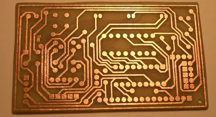 PCB during fabrication with etched copper traces
