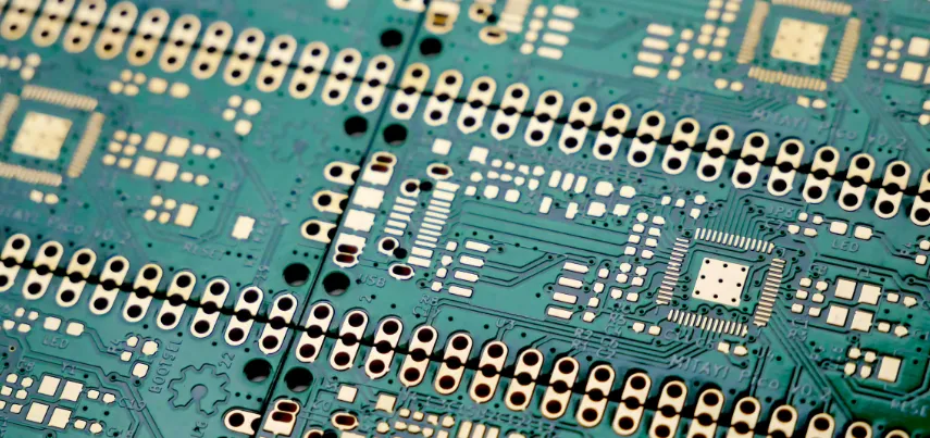 Microvias drilled on an FR-4 PCB using optimized laser parameters