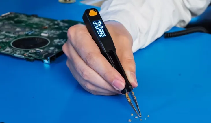 Testing PCB components with LCR meter probes for capacitance measurement