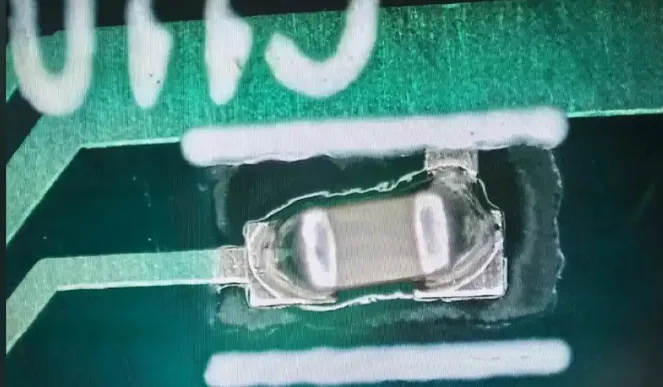 Failed electrolytic capacitor on a PCB due to overheating