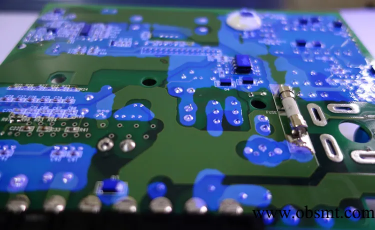 Selective conformal coating