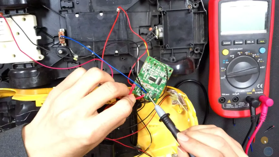 Testing power supply voltage on a network switch PCB with a multimeter