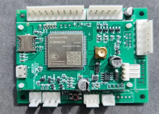 Close-up of vending machine PCB with sensors and communication modules