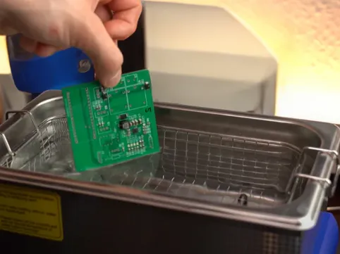PCB cleaning using ultrasonic waves for residue removal