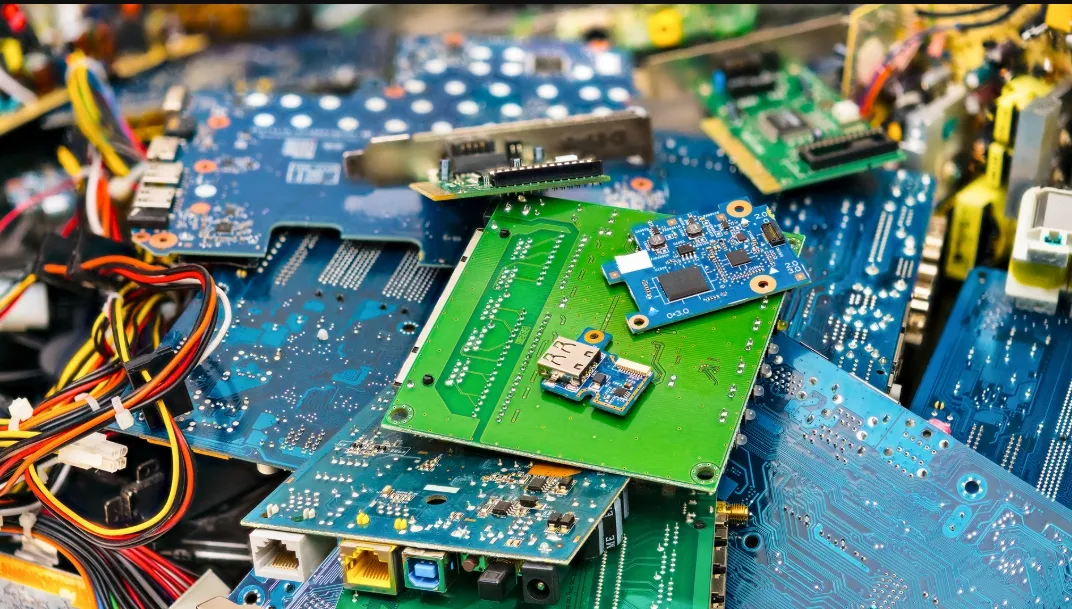 Electronic components sorted for safe disposal at an e-waste recycling center