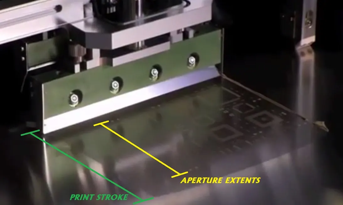 Technician performing printer calibration on solder paste printer