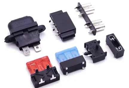 Close-up of blade fuse holder on vehicle control PCB