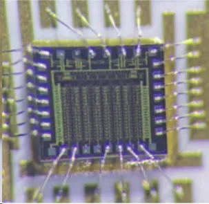 Microscopic view of reliable wire bond on soft gold-plated PCB pad.