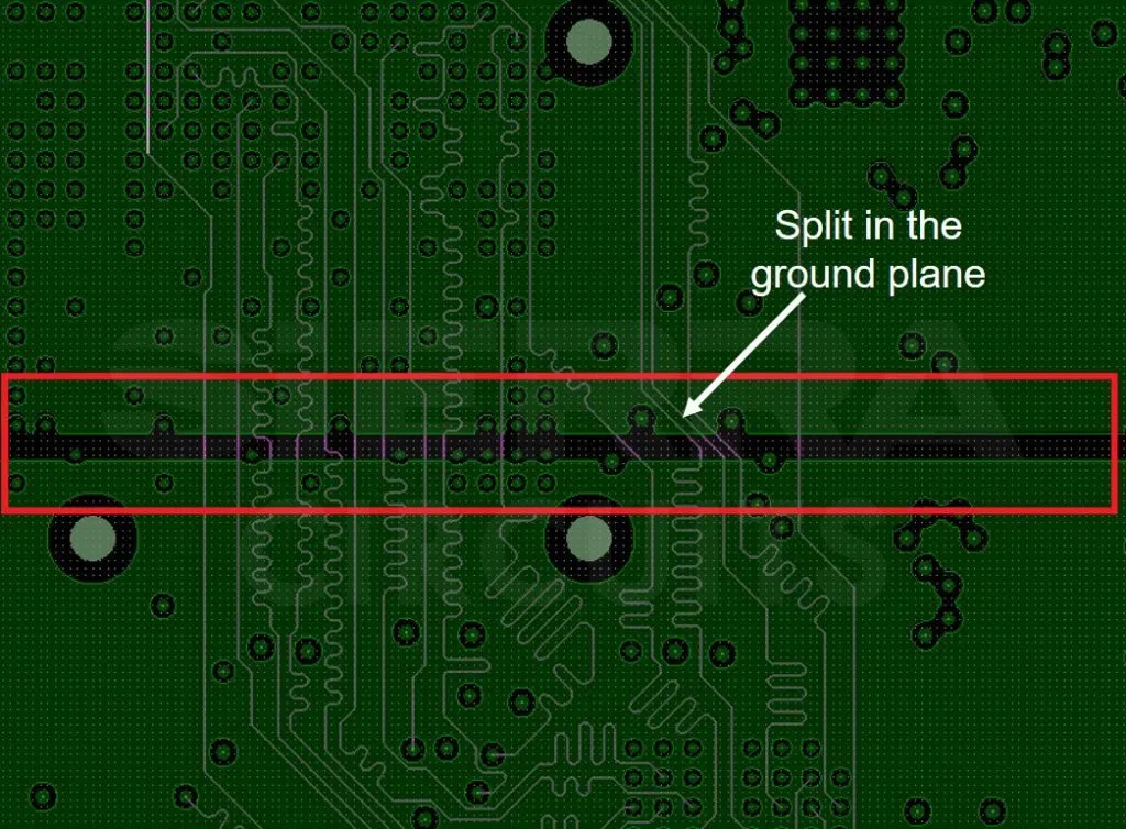 Small PCB layout showing crosstalk risks and fragmented ground plane issues.