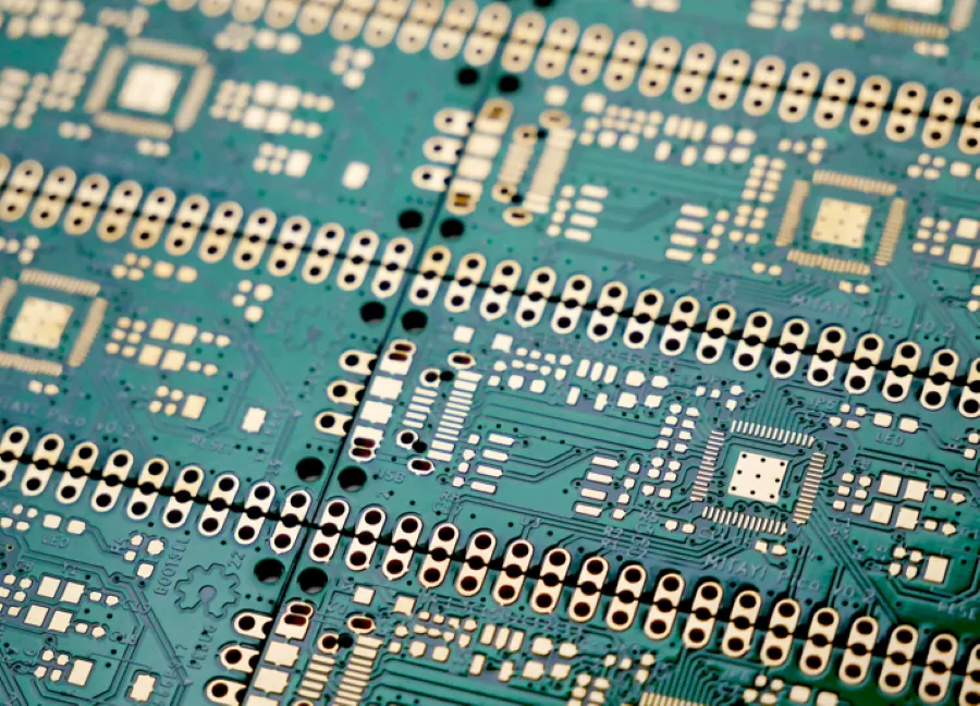 Cracked PCB edge near mouse bites caused by thermal stress