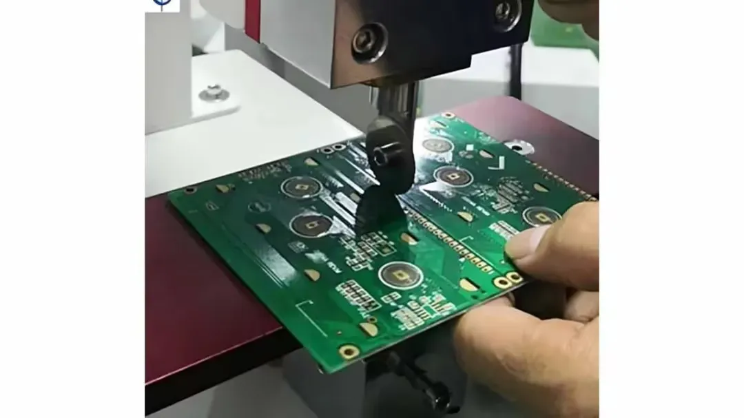 Hobbyist using a tool for DIY V-scoring on a PCB at home